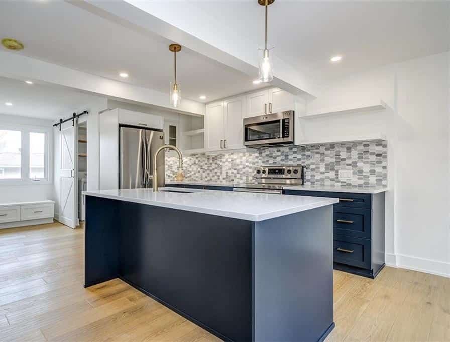 Two tone cabinetry; where dark and light tones are mixed to add character.